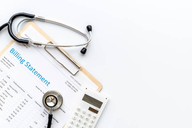 istock Medical billing statement with stethoscope. Top view 1323500927
