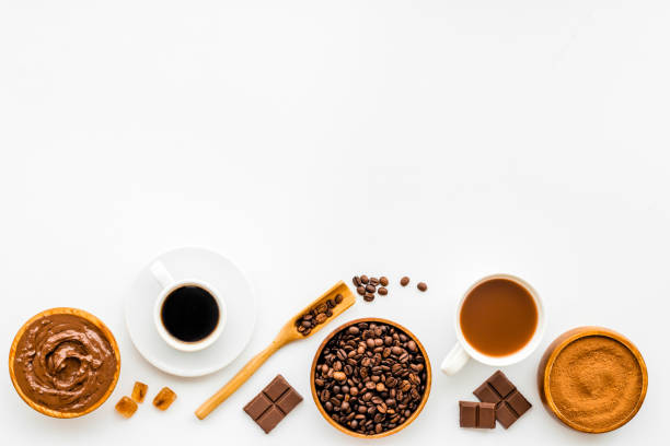 istock Background with assorted coffee and cocoa - beans with powder and hot drink 1323503977