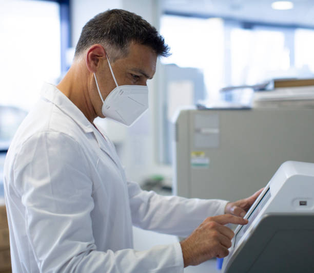 istock scientist working in biology laboratory 1323506871