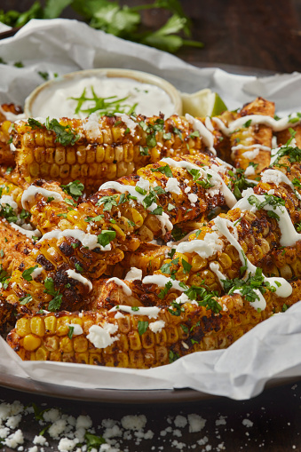 Made Famous on Social Media- Dry Rubbed Air Fried Corn Ribs with Lime Crema, Cotija Cheese and Cilantro