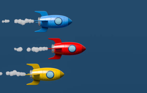 istock Cartoon Spaceships Racing on Blue Background 1323510213