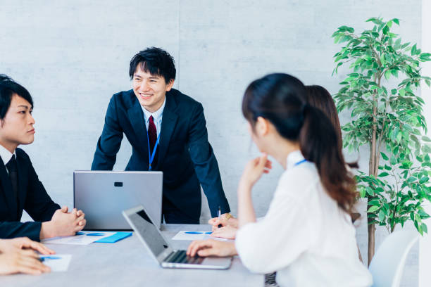 istock Business persons working in an office 1323510533