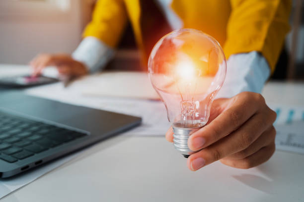 istock hand holding light bulb. idea concept with innovation and inspiration 1323513323