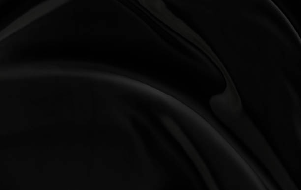 istock Black gray satin dark fabric texture luxurious shiny that is abstract silk cloth background with patterns soft waves blur beautiful. 1323514923
