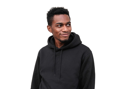 Portrait smiling young african man wearing a black hoodie looking away isolated on a white background