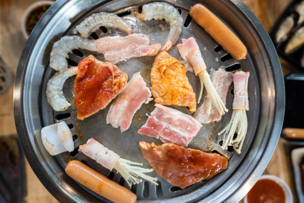 istock BBQ grilling meal with various kind of meat. 1323521617