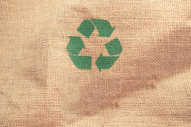 istock Recycled arrows sign on a shopping bag 1323521827