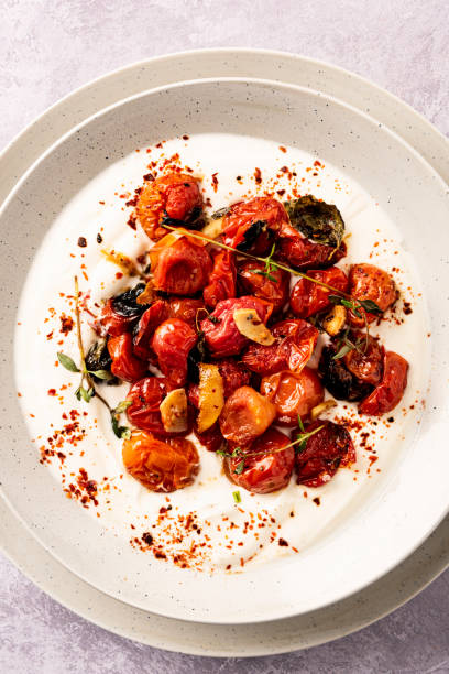 istock Oven Baked Cherry Tomatoes with Greek Yoghurt 1323522262