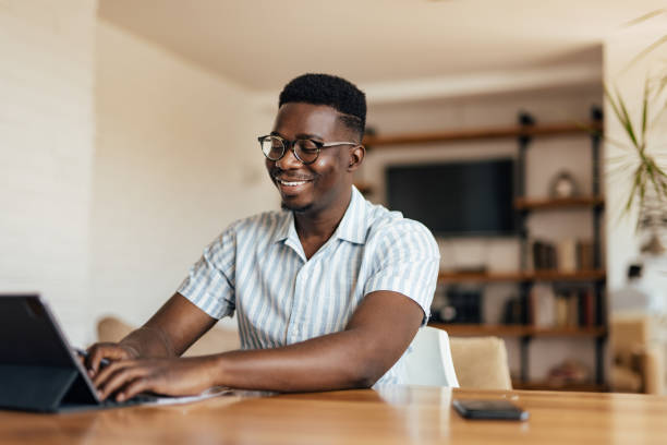istock Adult man, using his laptop to write. 1323523696