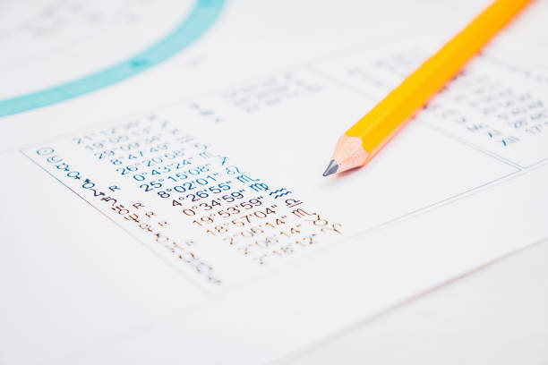 istock Modern astrologer's desktop. Thoughts of an astrologer 1323525760