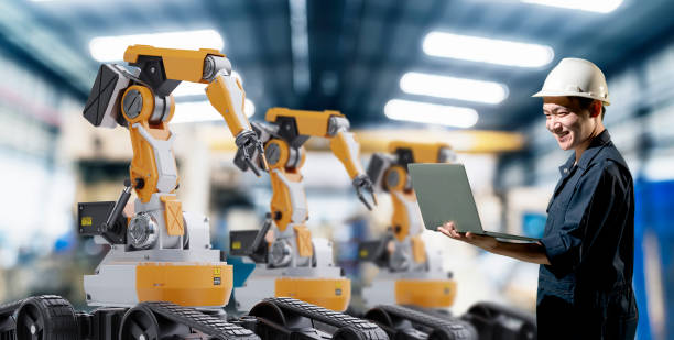 istock Engineer working with robot arm machine industrial 4.0 technology in factory. Futuristic innovation digital technology production management. 1323525984