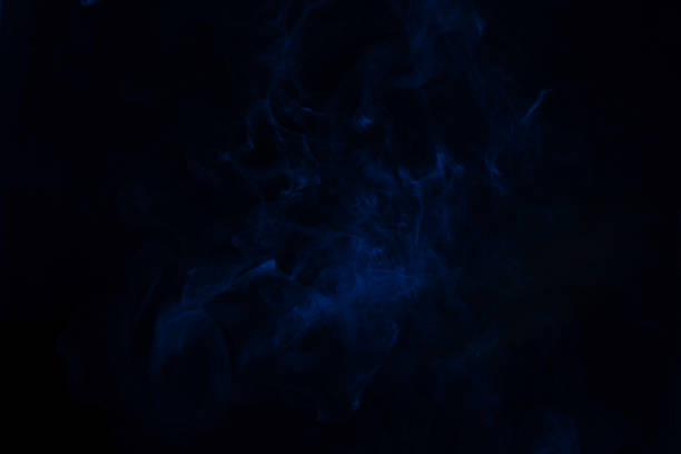 istock Blue and pink steam on a black background. 1323530170