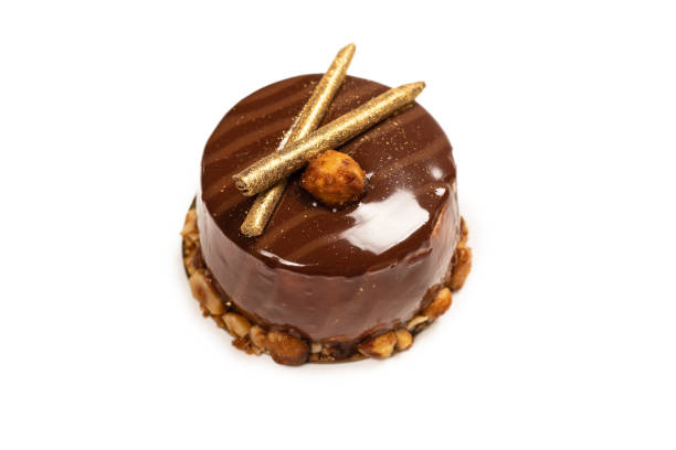 istock Chocolate and caramel cake isolated on a white background. 1323530203