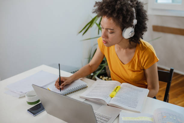 istock Mature female student is studying at home 1323534244