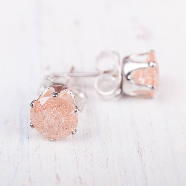 Little earrings - carnations with pink stones.