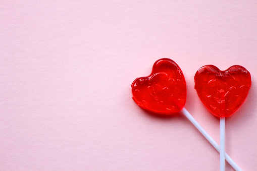 Unbranded generic heart lollipop - concept love/relationship. Room for your text.