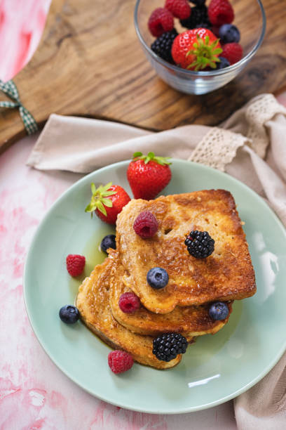 istock French Toast with Berries and Maple Syrup 1323545257