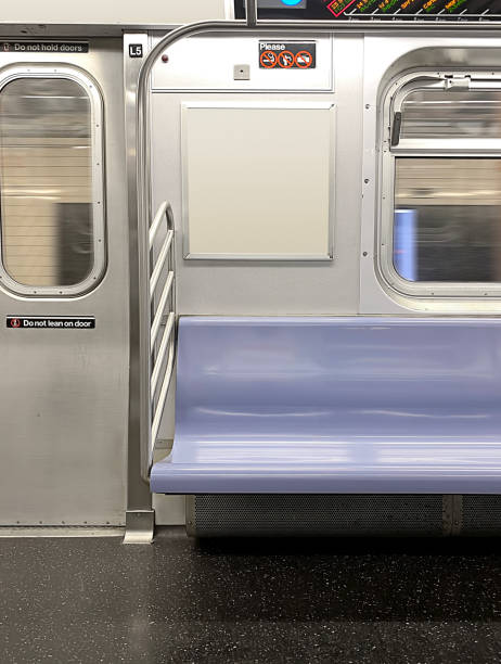 istock Subway seats and blank billboard 1323547315