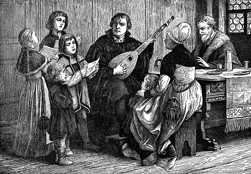 Martin Luther playing a lute and singing psalms with his family (circa 16th century). Vintage etching circa 19th century.