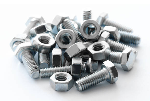 istock Metal nuts and bolts Isolated on white background 1323553699