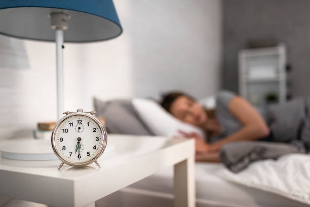 istock Alarm clock early in the morning. Time or waking up. 1323554503