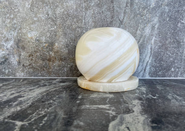 istock A close-up onyx candle holder stands on a grey marble table 1323556609