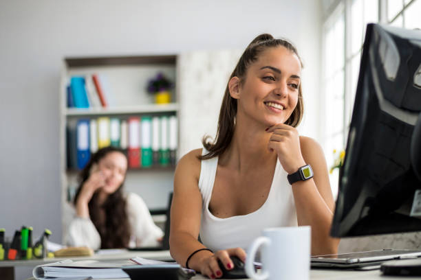 istock Two women work in the office 1323556953