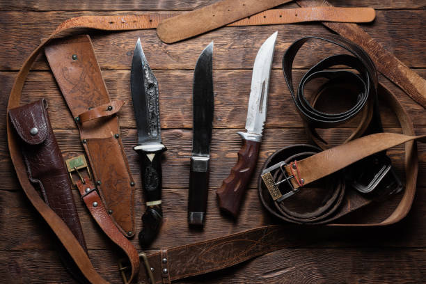 istock Belts and knives. 1323564481