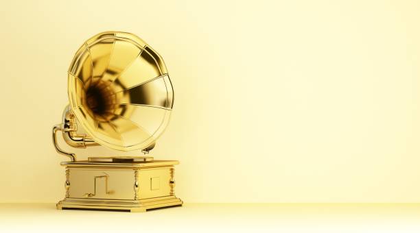 gold gramophone on yellow background