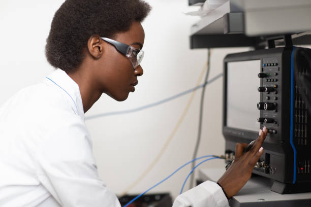 istock Scientist african american woman working in laboratory with electronic instruments 1323566986