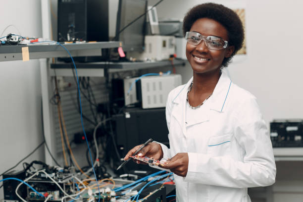 istock Scientist african american woman working in laboratory with electronic instruments 1323566991