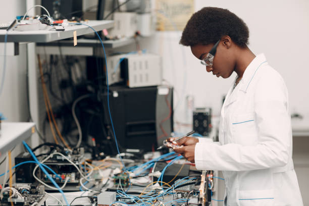 istock Scientist african american woman working in laboratory with electronic instruments 1323566994