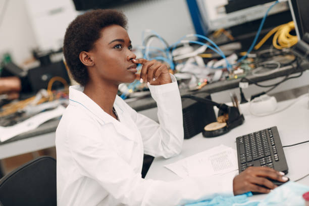 istock Scientist african american woman working in laboratory with electronic instruments 1323567432