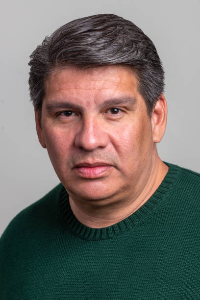 istock Serious sad mature hispanic man looking at the camera 1323568030