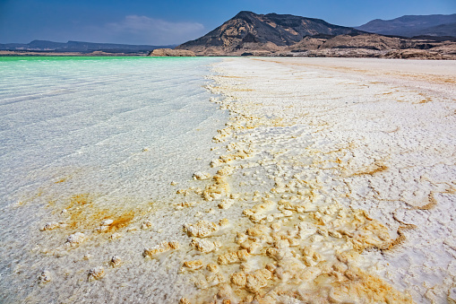 Beach with salt deposit at Lake Assal, Tadjourah Region in Djibouti, East Africa.