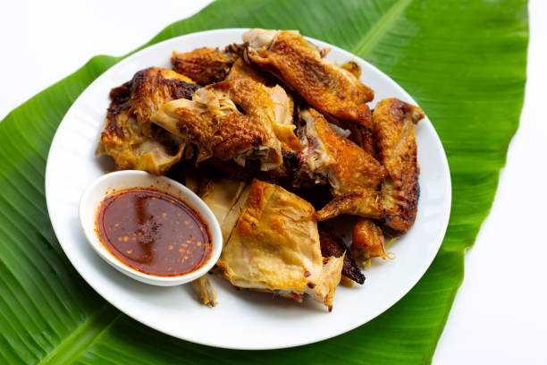 istock Grilled chicken, Thai style food on banana leaf 1323573044