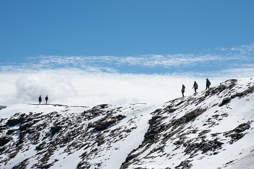A photograph showing hikers traveling to the remote and high altitude region of Bolivia South America
