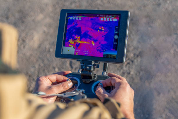 firefighter flying drone with thermal camera San Rafael, Argentina, June 12, 2021: firefighter flying drone with thermal camera thermal image stock pictures, royalty-free photos & images