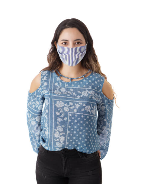 istock Beautiful woman in a protective face mask 1323577034