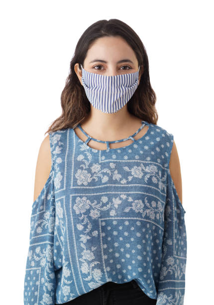 istock Happy young woman wearing face mask 1323577050