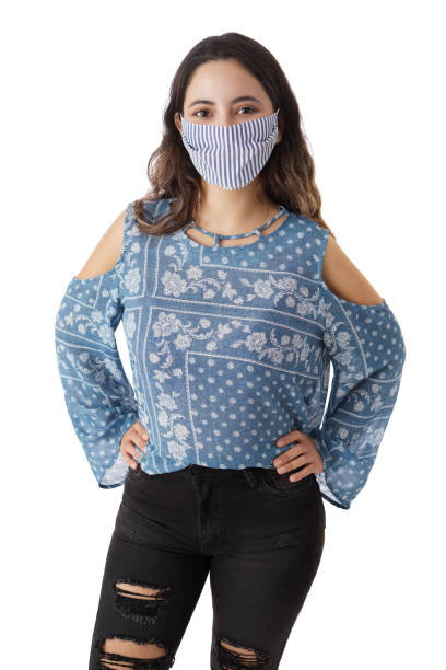 istock Pretty young woman wearing protective mask 1323577084