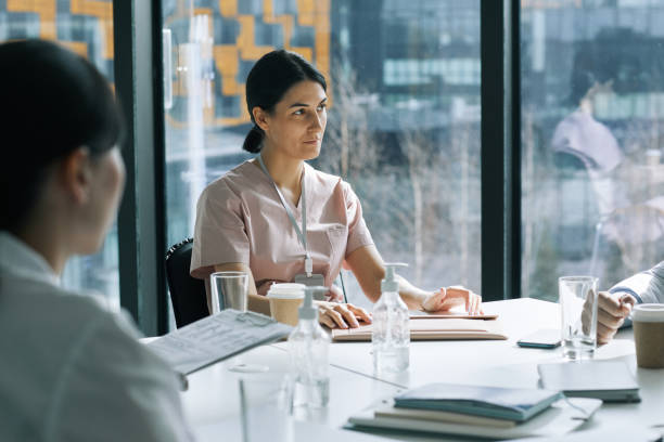 istock Female Doctor in Conference 1323583373