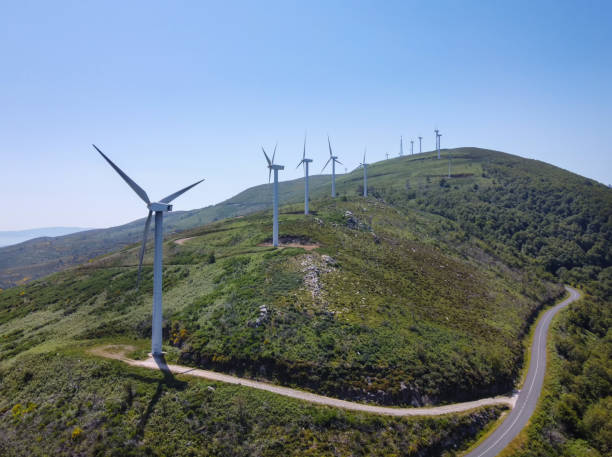 istock dilemma about the visual impact of a wind farm on beautiful mountain scenery 1323584365