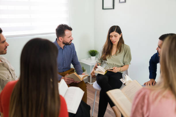 istock Diverse people discussing about literature 1323585945