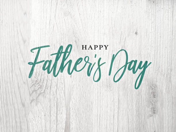 happy father's day scrittura calligrafica verde su legno bianco - fathers day foto e immagini stock