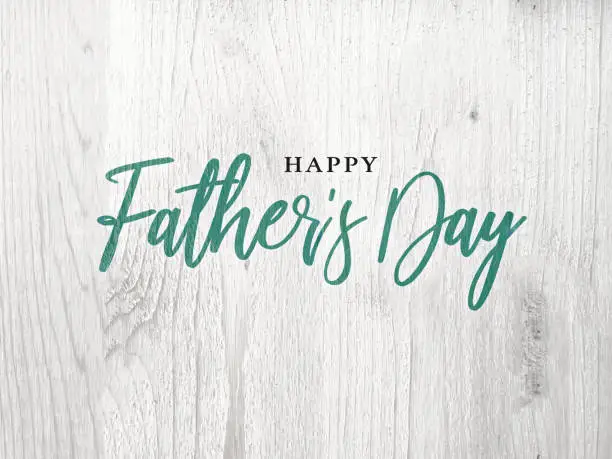 Photo of Happy Father's Day Green Calligraphy Script Over White Wood