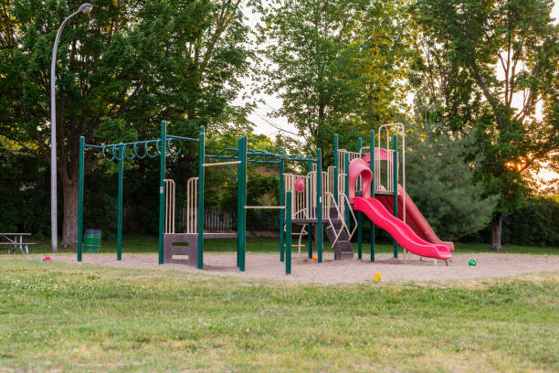 istock Playground for children in the public park during sunset. 1323603687