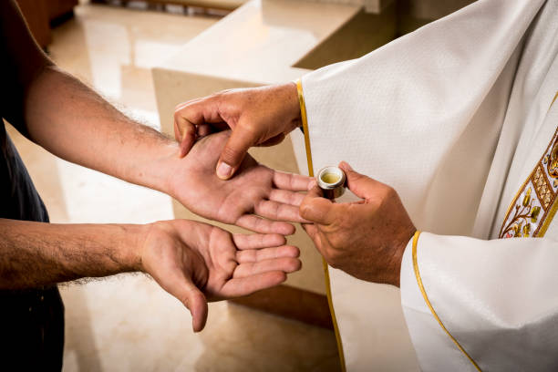 istock Hands of a Catholic priest. 1323604787