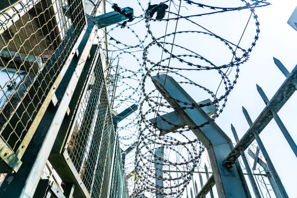 Barbed wire on the fence. Protective fencing specially protected