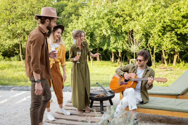 istock Friends having fun on a terrace near the forest 1323608169
